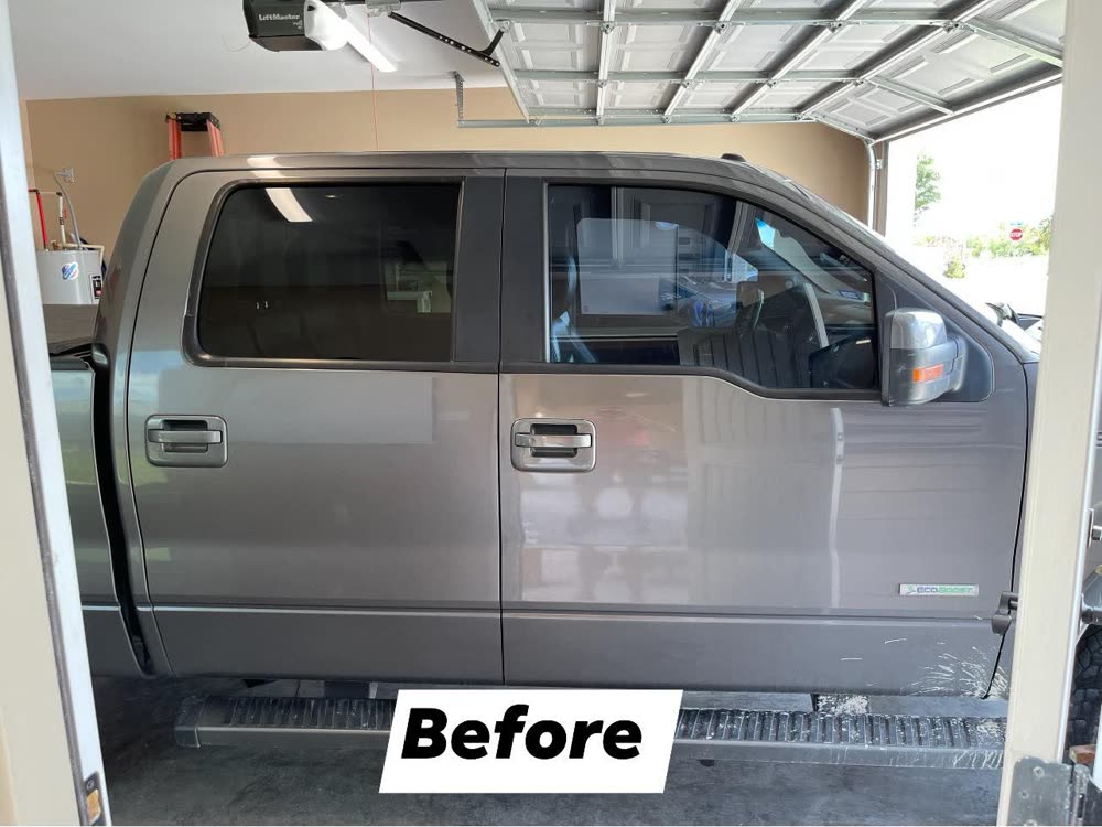 Passenger side of a silver Ford F-150 before tinting — both door windows are clear enough to see straight through the cab and out the far side